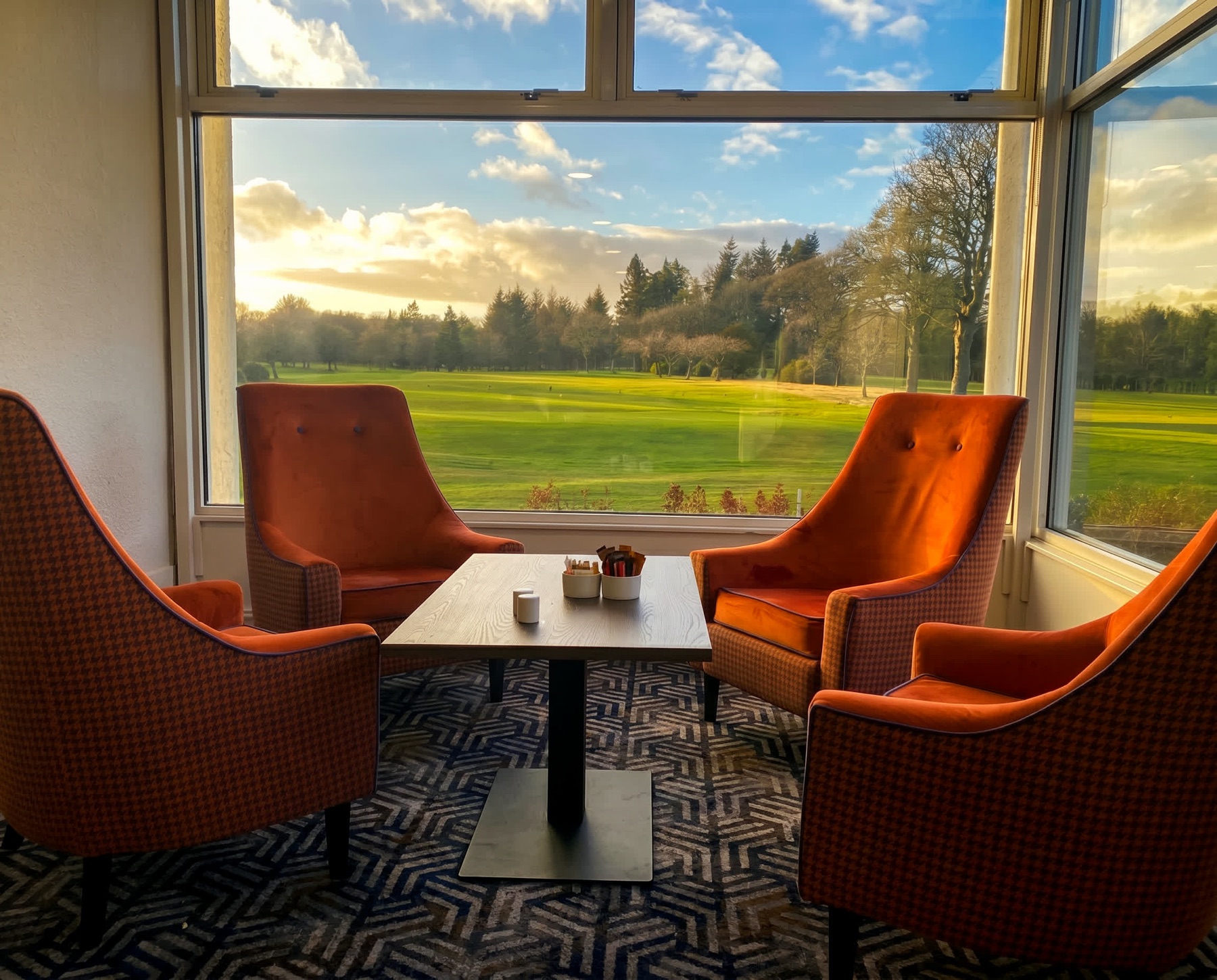The clubhouse lounge overlooking the 18th
