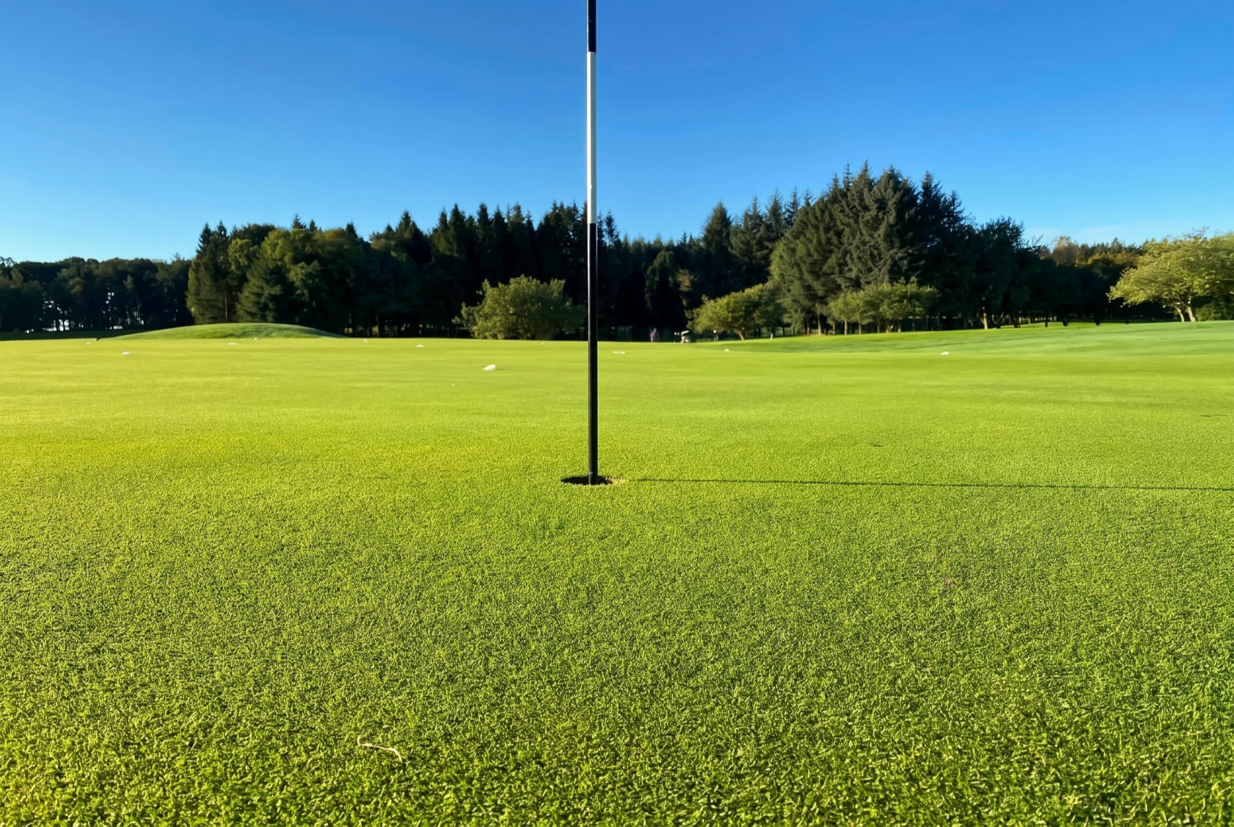 The clubhouse and putting green